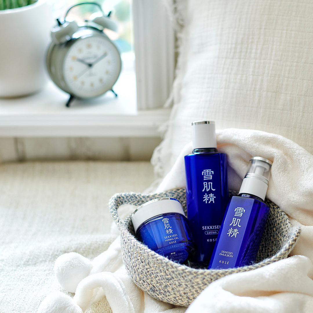SEKKISEI Herbal Gel, Lotion, and Emulsion in a knit basket