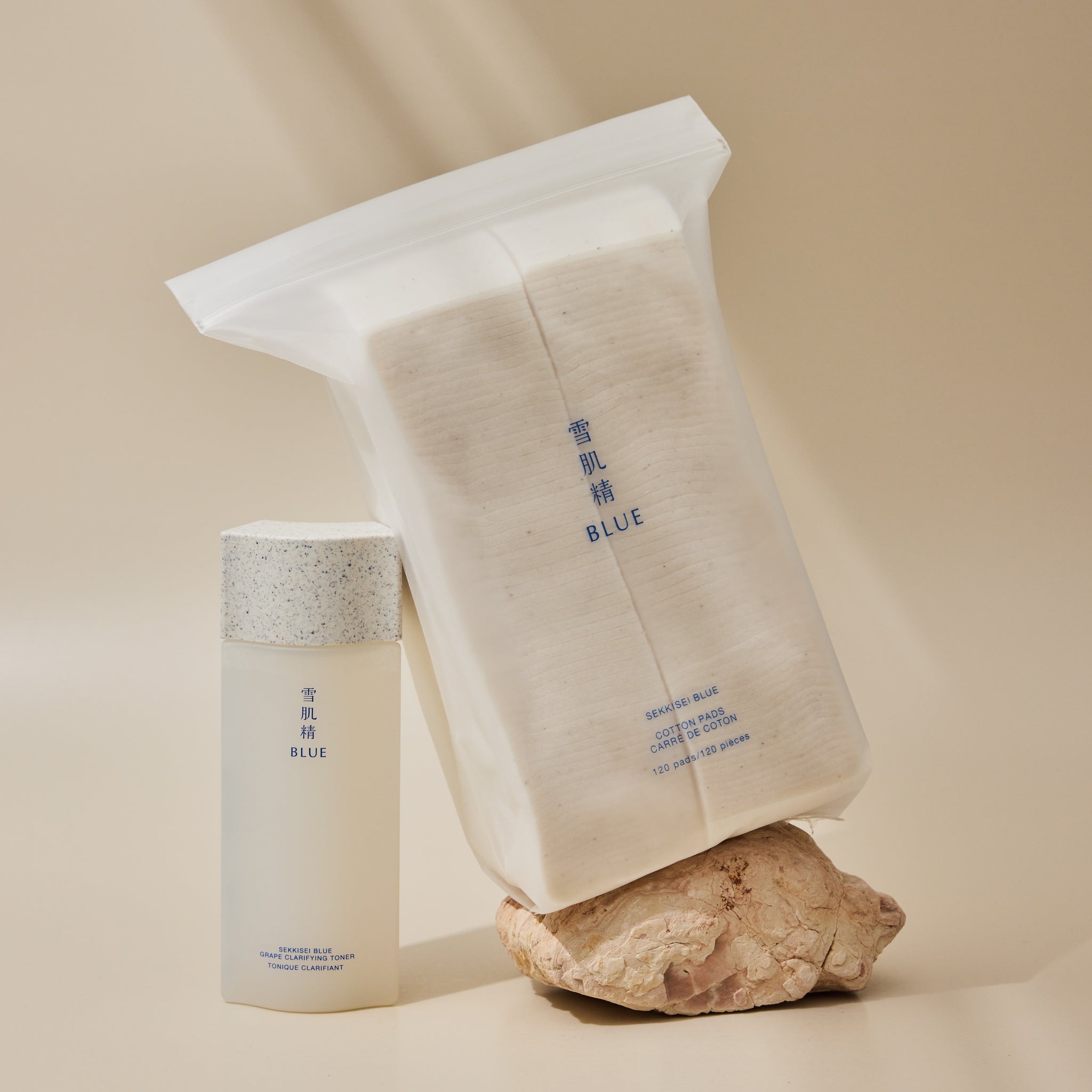 Skincare set featuring Blue Cotton Pads and Blue Grape Clarifying Toner